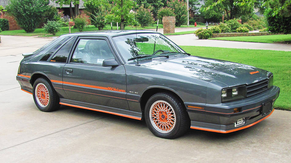 Rare silver sports car presented in a private collection